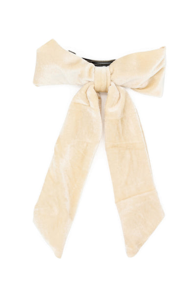 The Morgan & Taylor Piera Bow in Beige, a soft, velvet clip with Bow detail. 
